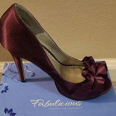 Fabulicious Brand. Sz 8. Never Worn. In Original Box And Packaging. Open Toe, Ruffle On Top Of Shoe, 4" Heel, Color Is Eggplant. Fabric Is Satin. Elegant Purple Synthetic Heels, Fringe Heels, Jeweled Heels, Suede High Heels, Rhinestone Heels, Brown Heels, Bow Heels, Classic Heels, Block Heel Shoes