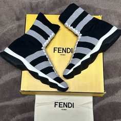 Selling A Nwot Pair Of Fendi Black And White Sock Sneakers. High Top. Never Worn. Comes With Protective Dust Bags And Original Yellow Fendi Shoe Box. Women’s Size Eu 37. Fendi Sneakers, Fendi Pink, Candy Logo, Black And White Socks, Women Slip On Sneakers, Sneakers High Top, Studded Sneakers, Sock Sneakers, Fendi Logo