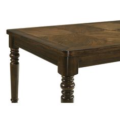 a wooden table with two turned legs and a square top on an isolated white background