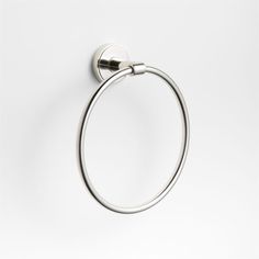 a chrome towel ring on a white background