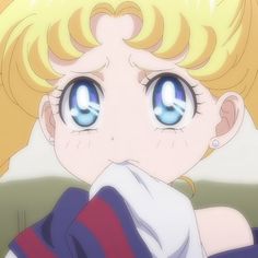 an anime character with blonde hair and blue eyes