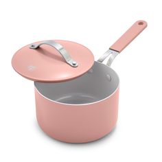 a pink pot with a lid and spoon in it on a white background, 3d rendering