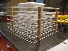 a metal rack sitting on top of a kitchen counter