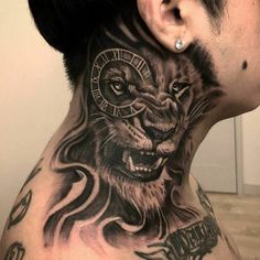 a man with a lion tattoo on his neck and behind the ear is a clock