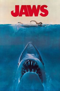 a movie poster for jaws with a shark in the water