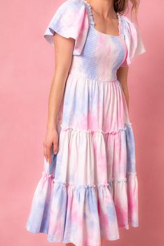 This magical dress is packed with the most whimsical details --- a flowy skirt, super soft 100% cotton, smocked bodice, and a subtle square neck-line that doesn't sacrifice coverage. Perfect for gender reveals, parties and just because. Cotton Candy Dress, Antoinette Dress, Gathered Fabric, Magical Dress, Candy Dress, Gender Reveals, City Woman, Crochet Infinity Scarf, Tiered Skirts