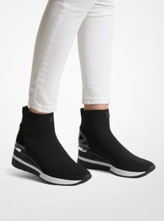 Our Skyler sock sneakers are renewed in a high-top silhouette crafted from a stretch-knit fabric with patent leather at the heel. Comfortable yet refined, this pair is a chic finish to casual looks. Sporty High Ankle Sneakers For Fall, Slip-on High-top Sneakers For Fall, Textile Sneakers For Fall, Fall High-top Slip-on Sneakers, Fall Textile Sneakers, Sock Sneakers, Most Comfortable Shoes, Top Handbags, All About Shoes