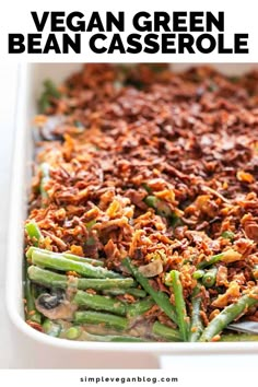 vegan green bean casserole in a white baking dish with text overlay