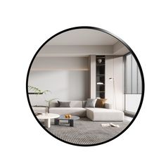 a living room filled with furniture and a round mirror