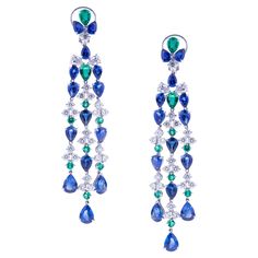 Chandelier Earrings with Blue Sapphires, Emeralds and Diamonds with White Gold. Stones are set on a Chandelier Earrings with three Threads of Sapphires, Emeralds and Diamonds. The Sapphires weight is altogether 22.12 carats, mounted in white gold with Diamonds ct. 5.70 and Emeralds ct. 3.08. The weight of the gold is gr. 18.60. Angeletti Boasts an Exceptional History Made of Pure Jewelry Tradition, a Blend of History and Modernity. Flagship store established in Piazza di Spagna / Via Condotti Ar Argentium Silver Jewelry, Diamond Chandelier Earrings, Alexis Bittar Jewelry, Argentium Silver, Fabulous Jewelry, Flagship Store, Emerald Jewelry, Dream Jewelry, Fine Jewellery Earrings