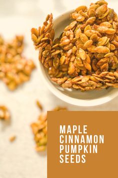 maple cinnamon pumpkin seeds in a white bowl with text overlay that reads maple cinnamon pumpkin seeds