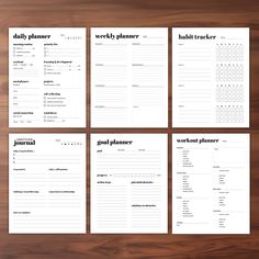 four printable daily planner pages with black and white text on them, sitting on a wooden