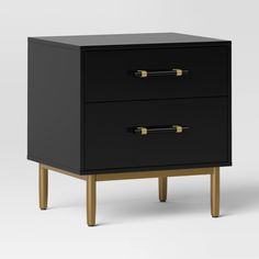 a black and gold nightstand with two drawers on one side, the other is open