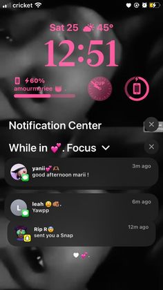 the notification screen for an upcoming event is shown in black and white, with pink accents