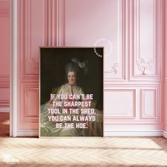 a pink room with a poster on the wall and a quote about shakespeare's play