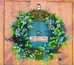 a green door with a wreath hanging on it