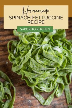 homemade spinach fettuccine recipe on a wooden table