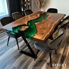 the table is made out of wood and has green paint on it's surface