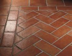 an orange brick floor with green lines on it