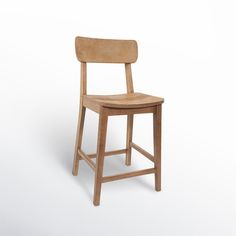 a wooden chair on a white background with the seat up and back turned to the right