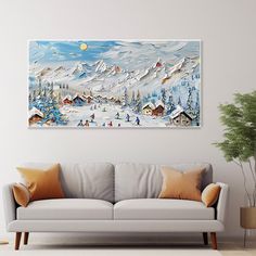 a living room with a couch and painting on the wall above it that has snow covered mountains in the background