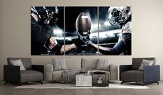 a living room with couches and two football players on the same panel wall art