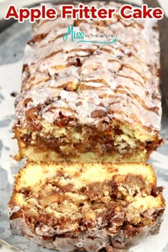 a loaf of apple fritter cake sitting on top of a table