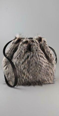 Marc by Marc Jacobs Party Rat Regine Faux Fur Bucket Bag Purse Features Faux Fur Mouse charm Inside pocket  Inside is clean and in good condition. The bag is in good condition. Approximate Measurements 11" L x 5" D x 13" H The complete eBay Selling Solution. Every buyer gets a MyStoreRewards invitation for cash back Track Page Views With Auctiva's FREE Counter Party Rat, Fur Bucket, Faux Fur Bag, Fur Purse, Fur Accessories, Sewing Purses, Leather Pouch