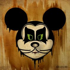 a mickey mouse face with green eyes and black ears, dripping paint on the wall