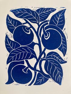 a blue and white print with fruit on it's leaves in a square shape