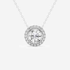 Bezel set or halo?  Here you can have both!  This round lab grown diamond is nestled in a bezel setting and then surrounded by a heavenly halo of smaller round diamonds for that extra shimmer.  It's not a tough choice with this perfect pendant! Luxury Dainty Jewelry With Halo Setting, Luxury Timeless Diamond Necklace With Halo Design, Round Halo Setting Necklace With Lab Grown Diamond, Luxury Sterling Silver Medallion Necklace With Round Pendant, Silver Necklace With Halo Setting And Round Pendant, Luxury Halo Diamond Necklace In Sterling Silver, Dazzling Round Pendant Necklace With Halo Setting, White Diamond Necklace With Halo Round Pendant, Diamond White Round Pendant Necklace With Halo