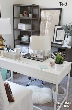 a white desk topped with a laptop computer