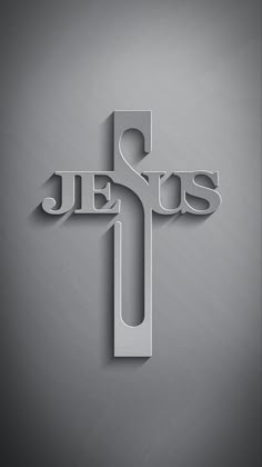 the word jesus written in cut out paper on a gray and black background with shadow