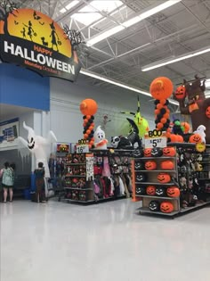 halloween decorations are on display in the store