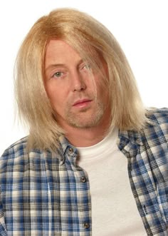 a man with long blonde hair wearing a plaid shirt