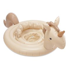 an inflatable toy horse laying on top of it's back and head