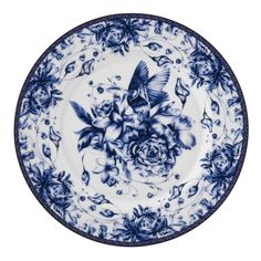 a blue and white plate with flowers on it