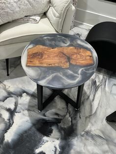 a black and white marble coffee table in a living room