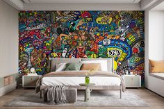 a bedroom with a large mural on the wall