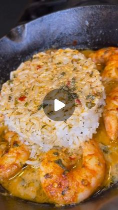 shrimp and rice in a skillet being cooked