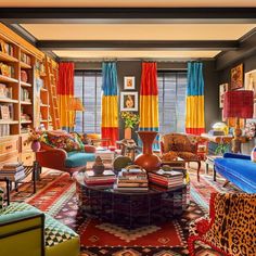 a living room filled with lots of colorful furniture