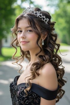 Voluminous curls crowned with a tiara headband, transforming the wearer into prom royalty. This hairstyle exudes grandeur and elegance, ideal for making a majestic statement at prom. Hair Styles For Tiara, Half Updo With Tiara, Crown Hairstyles Tiaras, Prom Hair Tiara, Hairstyles For Bday Party, Prom Hair With Tiara, Curly Hair With Tiara