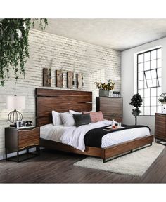 a bedroom with white brick walls and wooden furniture