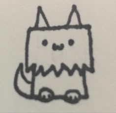 a drawing of a cat that is drawn on paper