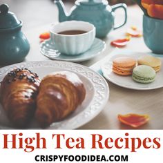 a table topped with plates of food and cups of coffee next to teapots