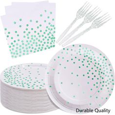 green polka dot paper plates with forks and napkins