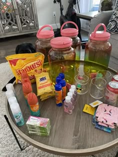 the table is covered with various items for making soaps and lotion on it