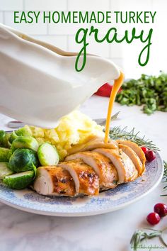 a turkey gravy being drizzled over mashed potatoes and brussel sprouts