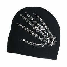 a black beanie with white crystals on it