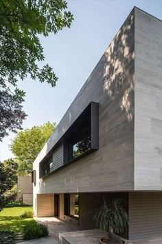 the modern house is located in an area that looks like it has been designed to look like